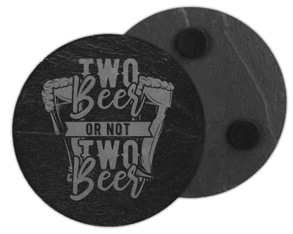 A laser engraved round slate coaster that has the quote two beer or not two beer with beer glasses on on either side of the quote